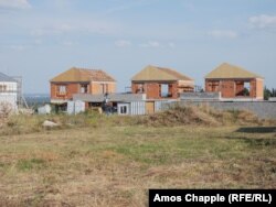 Houses under construction on the outskirts of Erd on July 12