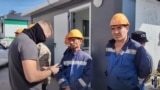 Migrant workers in Khabarovsk, Russia, get checked during a raid to find illegal immigrants.