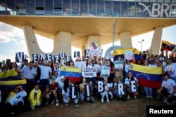 Граждани на Венецуела протестират срещу режима на Мадуро по време на президентските избори. Демонстрацията се състои в Бразилия, 28 юли 2024 г.