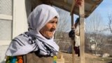 In the video, Shahboz Sharifbek accuses local officials of forcibly taking his brother from their home to enlist him in the army and beating his grandmother (pictured) in the process.