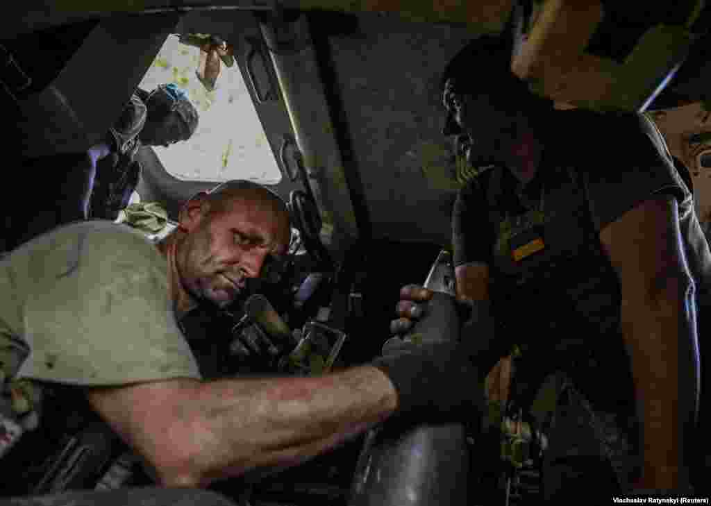 Ukrainian soldiers load 155-mm shells into a M109 self-propelled howitzer. The defenses have been dubbed &quot;Surovikin lines,&quot; named after Russian General Sergei Surovikin, who briefly commanded Moscow&#39;s forces that invaded Ukraine until he was demoted in January.