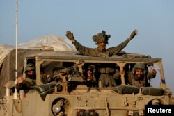 Израелски войници напускат Газа в първия ден от временното примирие, 24 ноември 2023 г.