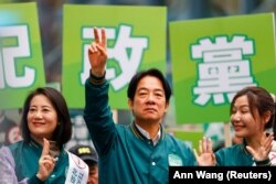 Лай Чін Те, колишній віцепрезидент, який нині змагається за президентське крісло від правлячої Демократично-прогресивної партії (DPP) під час виборчого мітингу в Тайпеї. 3 січня 2024 року
