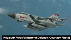 A British Royal Air Force Tornado GR4 aircraft is pictured fitted with a Storm Shadow cruise missile directly under the fuselage. (file photo)