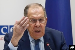 Russian Foreign Minister Sergei Lavrov talks to reporters at an OSCE meeting in Skopje earlier this month.