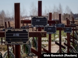 Могилы неустановленных лиц, в том числе детей, погибших во время российской оккупации Бучи