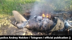 Обломки российской баллистической ракеты после воздушной атаки РФ на Киев, 18 мая 2023 года