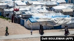 Žene i djeca u kampu Roj, gdje se nalaze rođaci osoba za koje se sumnja da pripadaju grupi "Islamska država", 28. marta 2021.