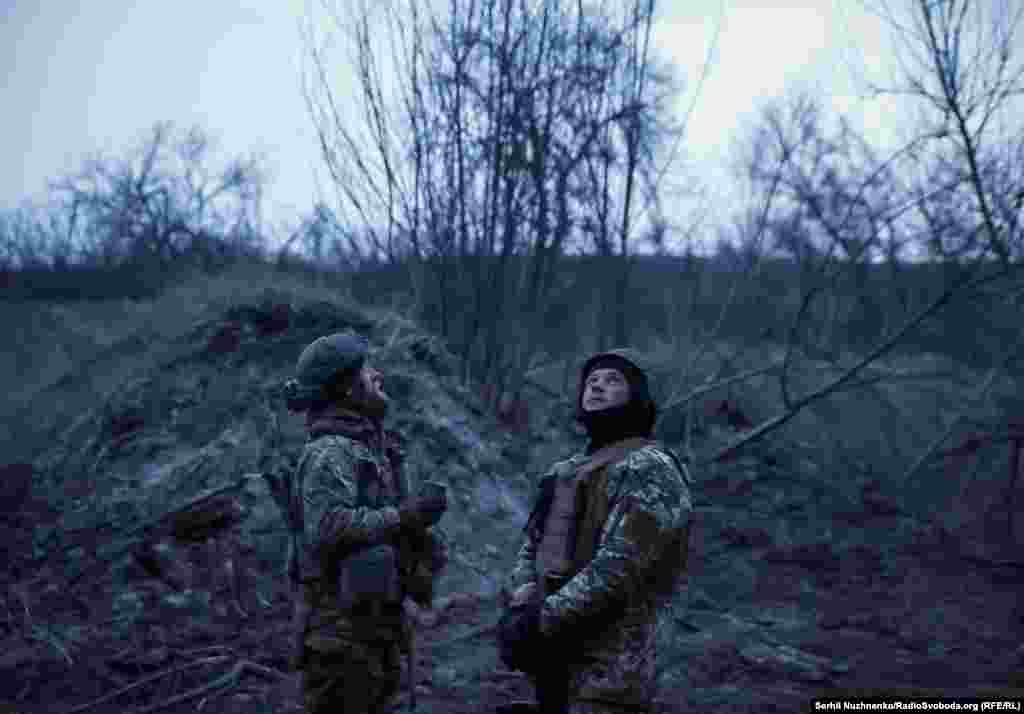 RFE/RL photographer Serhiy Nuzhnenko traveled to the front line near Bakhmut, where he met up with a small unit tasked with destroying Russian positions.