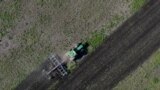 Tractor in mined fields in Ukraine