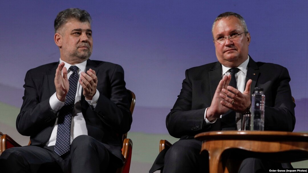 Premierul Marcel Ciolacu (stânga) și fostul premier Nicolae Ciucă, liderii coaliției de guvernare PSD-PNL.