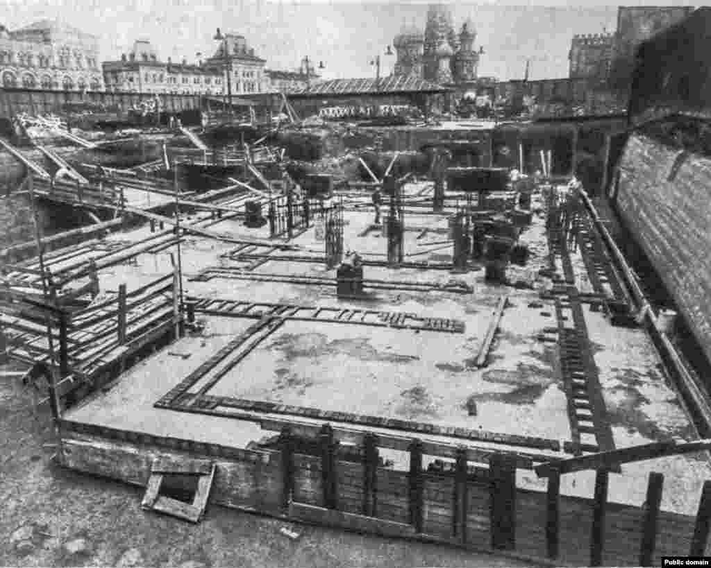 The foundations of Lenin&rsquo;s mausoleum being built in the late 1920s. Architect Aleksei Shchusev submitted a sketch for a red and black granite mausoleum echoing his two earlier wooden constructions that eventually won. The black granite was to represent &quot;mourning,&quot; while the chunky stepped design suggested the idea that &ldquo;Lenin died, but his work lives on,&rdquo; he later explained.&nbsp; &nbsp;