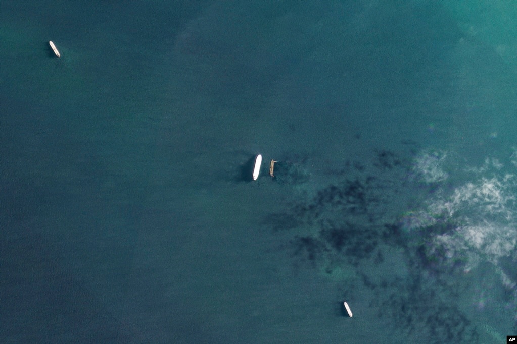 A tanker is photographed by satellite taking on Iranian oil in Asia.