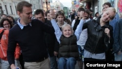 Алексей Навальный с сыном и супругой.