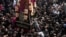 Pakistani Shi'ite Muslims take part in a procession marking Chehlum in Lahore, Pakistan.&nbsp;