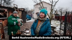 Bucha residents Natalya and Rustem on March 1, 2022. "It was very difficult, very scary to sit in the basement as battles roared outside," the couple said. "We thought we were in a safe zone, but you can see how it turned out."