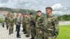 Serbian Defense Minister Milos Vucevic with members of the Serbian Army in May