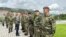 Serbian Defense Minister Milos Vucevic with members of the Serbian Army in May