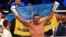 World boxing champion Oleksandr Usyk celebrates winning his fight against challenger Daniel Dubois from Great Britain in Wroclaw, Poland, on August 26. 