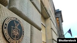 U.S. -- Department of Commerce sign seal emblem at headquarters building in Washington, January12, 2019.