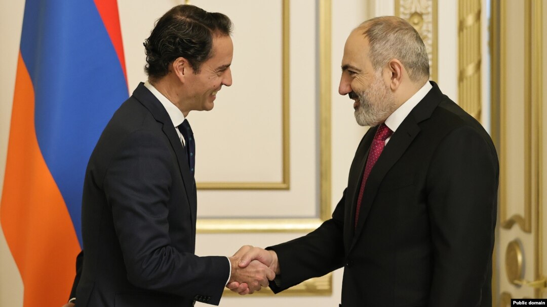 Armenian Prime Minister Nikol Pashinian (right) meets with Javier Colomina, special representative of the NATO secretary-general in the Caucasus and Central Asia, on January 19.