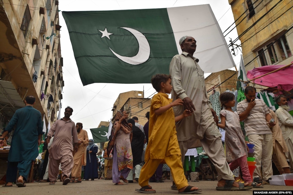 Pakistanis visit a market ahead of festivities.&nbsp; The naming of a caretaker premier follows on the heels of a political crisis surrounding former Prime Minister Imran Khan, who began a three-year prison term on August 5 for &quot;corrupt practices.&quot; Khan, who is also banned from politics, denies wrongdoing, claiming the charges against him were politically motivated.