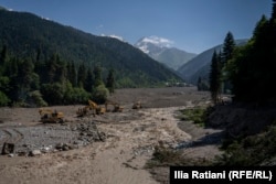 Heavy equipment aided rescue operations following heavy landslides on August 3 near Shovi, a resort town some 140 kilometers northwest of Georgia's capital, Tbilisi. Dozens of people were killed in the disaster. (Ilia Ratiani, RFE/RL's Georgian Service)