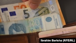 For two decades, encouraged by Belgrade and reluctantly ignored by Pristina, residents in 10 heavily ethnic Serbian municipalities have clung to the Serbian currency, the dinar.