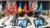 Representatives of Ukraine take part in a virtual meeting of the Ukraine Defense Contact Group in Kyiv on January 23.