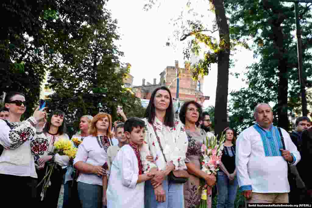 People wearing vyshyvankas attend an evening of commemoration for Babinskiy in Kyiv on August 16. &nbsp;