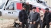 Initial reports indicate that a helicopter carrying the Iranian President Ebrahim Raisi (center) faced a rough landing, Iranian state TV said on May 19. 