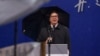 Serbian President Aleksandar Vucic addresses his supporters during a rally in front of the parliament building in Belgrade on May 26.