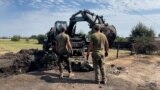 Ukrainian Military Clears Plane-Crash Debris