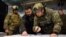 Ukrainian President Volodymyr Zelenskiy (center) visits the advanced command post in Kupyansk, Kharkiv region, on November 30.