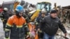 Rescuers remove the body of a woman who was killed during a Russian missile strike on the town of Zmiyiv, in the eastern region of Kharkiv, on January 8.<br />
<br />
Moscow&nbsp;<strong><a href="https://www.currenttime.tv/a/raketnyy-udar-armii-rf-po-ukraine/32765247.html" target="_self">launched</a></strong> a massive wave of missile strikes across Ukrainian regions, killing at least four civilians, wounding at least 40, and causing damage to infrastructure and economic facilities, Ukrainian officials and the military said.