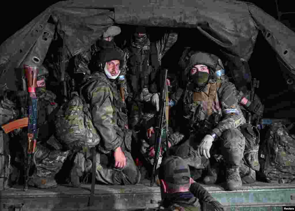 Fighters of the Wagner private mercenary group pull out of the headquarters of the Southern Military District to return to base, in the city of Rostov-on-Don, Russia, on June 24.