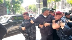 Arrests In Yerevan As Armenian PM Praises Border Deal With Azerbaijan