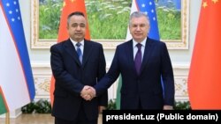 Uzbekistan - President Shavkat Mirziyoyev with Chairman of the Government of XUAR Erkin Tuniyaz, Tashkent, 28Mar2024