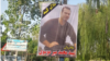 A banner in the northern Iranian city of Langarud shows the deceased Mohammad Mirmusavi, who died in police custody. 