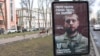 A recruiting poster for the Offensive Guard in central Kyiv uses the slogan "Turn your rage into a weapon."