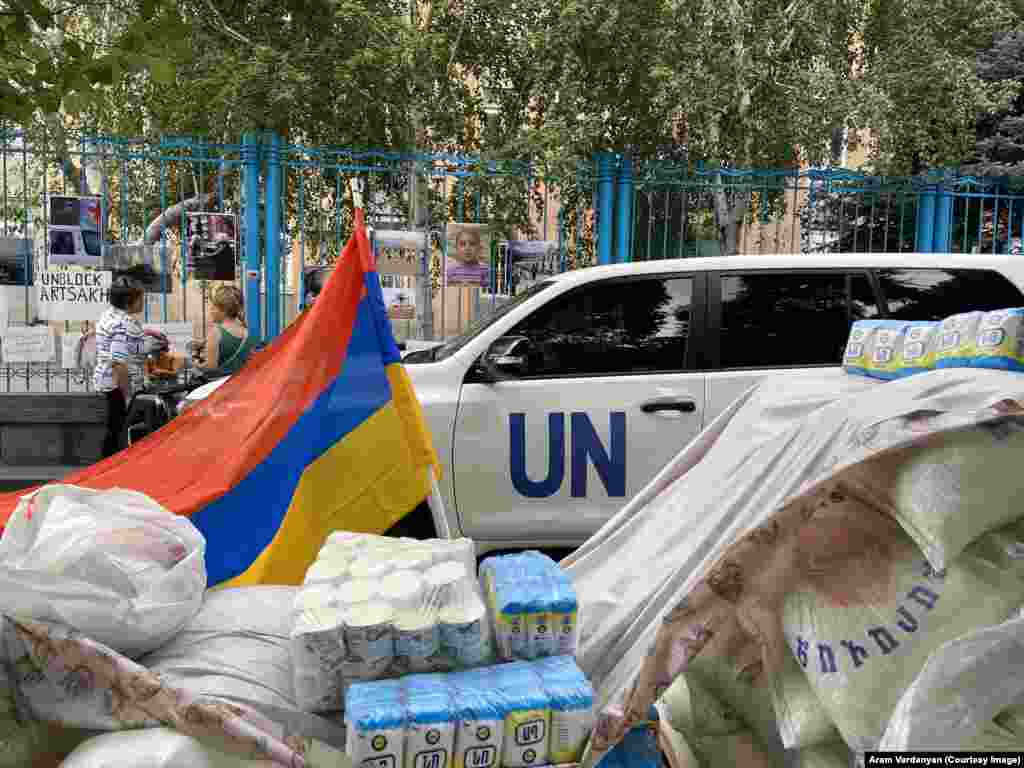 Piles of food placed outside the UN headquarters by protesters in Yerevan. Speakers at the July 24 demonstration called for the international organization to transport supplies into Nagorno-Karabakh. Aram Vardanian, who attended the protest outside the UN house on July 24, told RFE/RL that the organization is being singled out because &ldquo;wherever there is a shortage of food, the UN has always tried to deliver humanitarian aid.&rdquo;