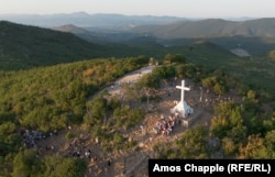 A group of Catholic Ukrainians pose for a photo atop Cross Mountain on August 4.