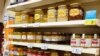 Romania - Honey Jars on supermarket shelves shelves 