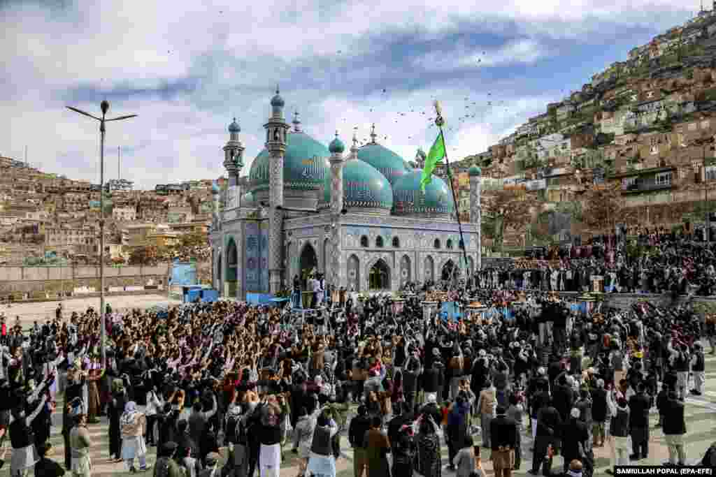 Afghans gather around the Sakhi Shah-e Mardan&nbsp;shrine as they celebrate the Persian New Year.