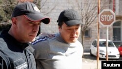 Do Kwon (right) was arrested in Montenegro in March last year. (file photo)