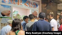 Nagorno-Karabakh - People line up outside a bakery in Stepanakert.