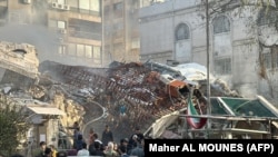 Romok a feltételezett izraeli légicsapást követően Damaszkuszban 2024. április 1-jén