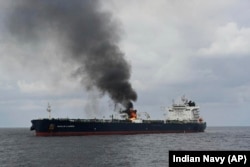 A view of the Marlin Luanda oil tanker on fire on January 27 after a missile attack in the Gulf of Aden by Yemen's Iran-backed Huthi rebels.