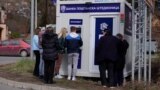 Serbia - a bank machine near the border with Kosovo where Kosovo Serbs come to get cash because of the foreign currency ban - screen grab