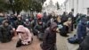 Believers of the Ukrainian Orthodox Church pray at the historic Pechersk Lavra in Kyiv on March 29. Hundreds of worshippers attended a service at the historic Kyiv monastery accused of maintaining links with Moscow.